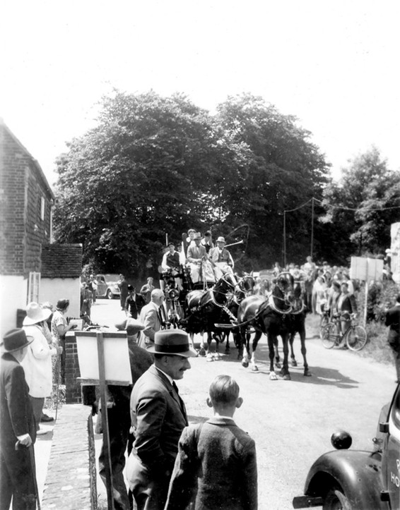 Members of The Men of Hambledon cricket team arrive in style at The Bat and Ball aboard Tom Parker’s coach.